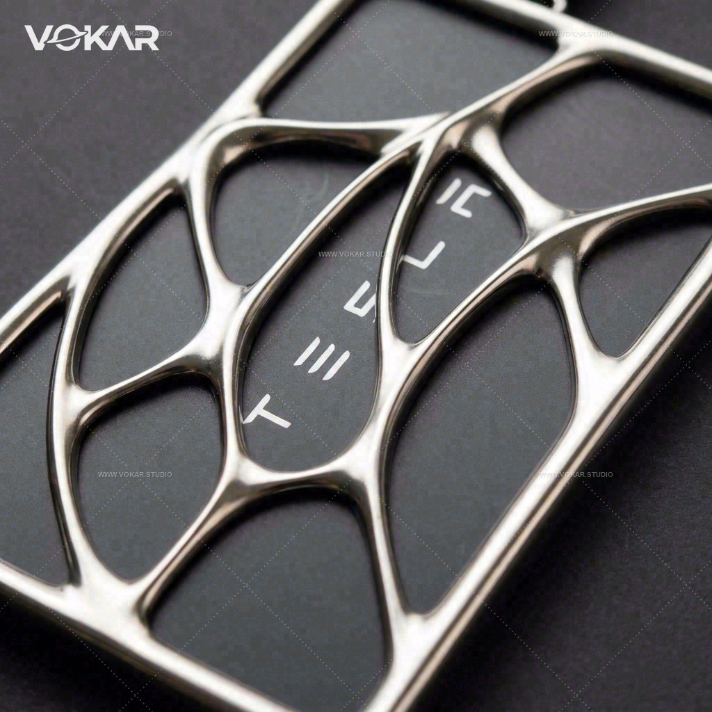 Square studio close-up of raised silver lines over the Tesla key card